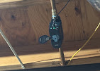Crawlspace pipe work — overhead pipe fitting and support
